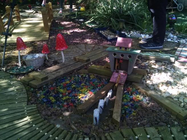 backyard garden art; noah's ark; bridge, paths, mushroom chimes
